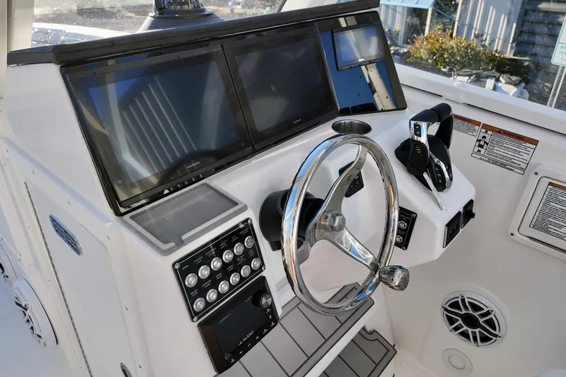 Slide: The Image of 2026 Sea Fox 288 Traveler boat dashboard with modern controls and dual screens. - 15