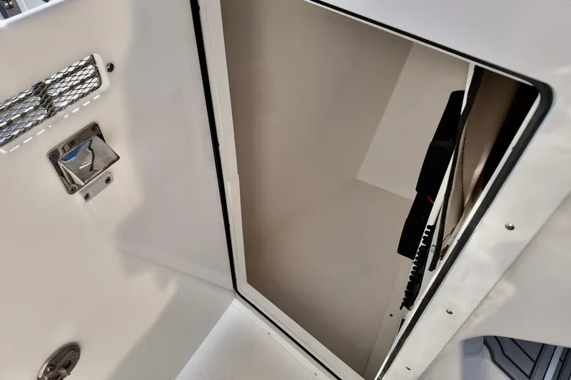 Slide: The Image of Interior view of 2026 Sea Fox 288 Traveler boat compartment with storage features. - 6