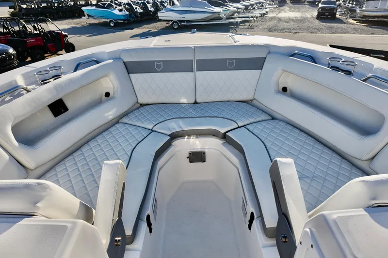 Slide: The Image of Luxurious seating area on 2026 Sea Fox 288 Traveler boat, featuring quilted upholstery and cup holders. - 8