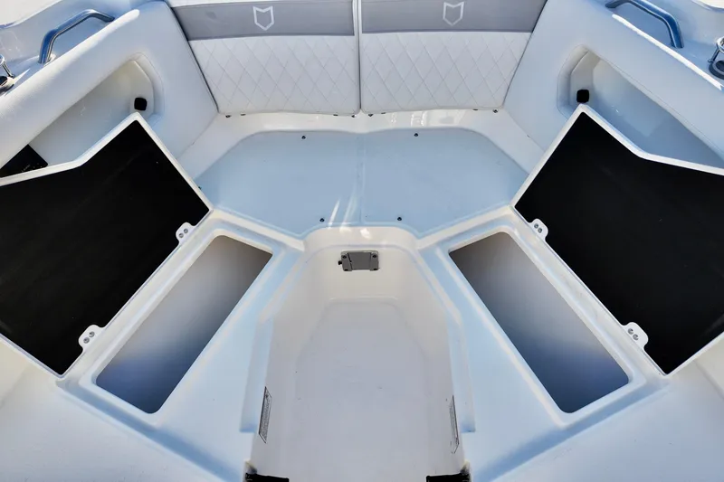 Slide: The Image of 2026 Sea Fox 288 Traveler boat interior with open storage compartments. - 9