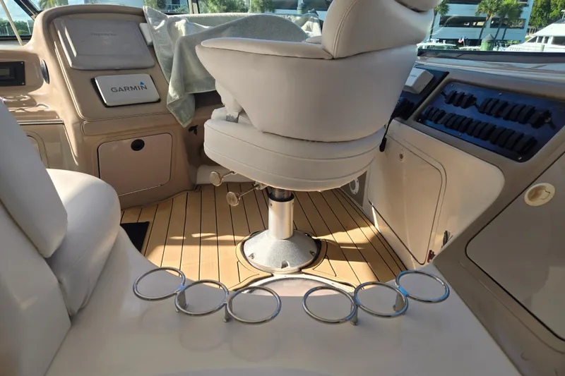 Slide: The Image of Interior of 2000 Sea Ray 540 Sundancer yacht with helm seat and Garmin navigation. - 22