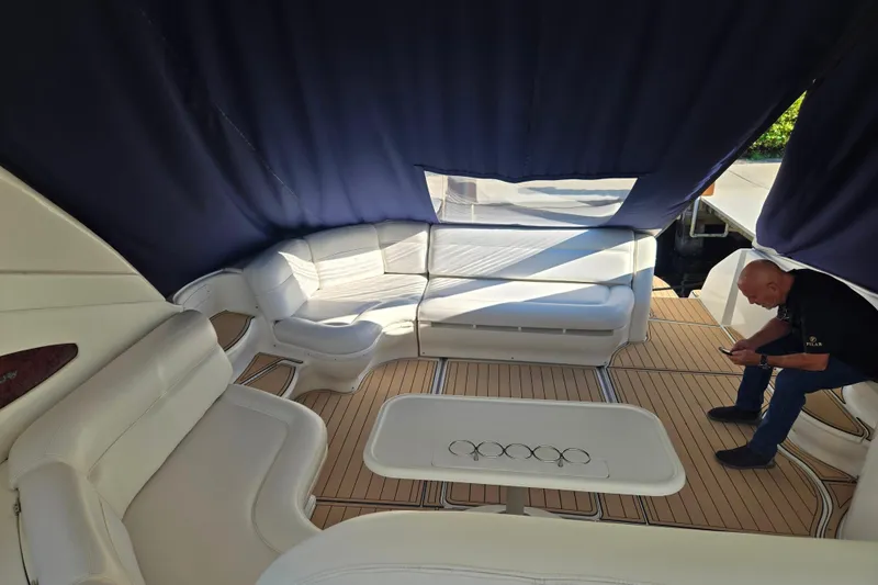 Slide: The Image of Luxurious interior of 2000 Sea Ray 540 Sundancer yacht with seating and table. - 30