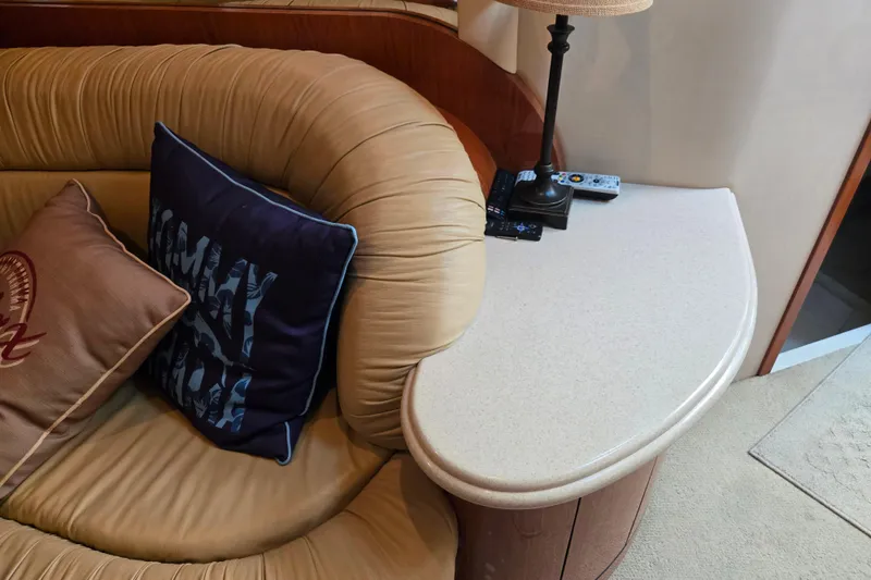 Slide: The Image of Luxurious interior of 2000 Sea Ray 540 Sundancer with plush seating and elegant decor. - 36