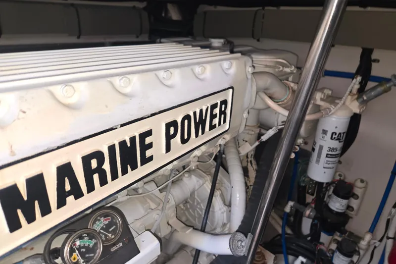 Slide: The Image of Engine room of 2000 Sea Ray 540 Sundancer with Marine Power components. - 68