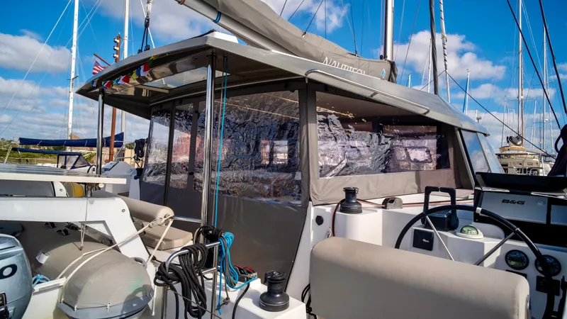 Slide: The Image of Nautitech 40 Open 2019 catamaran docked under clear skies. - 12