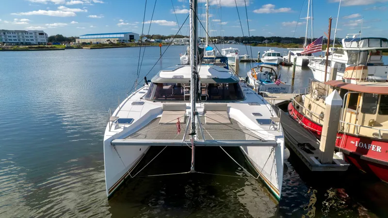 Slide: The Image of Nautitech 40 Open 2019 catamaran docked, sunny day. - 2