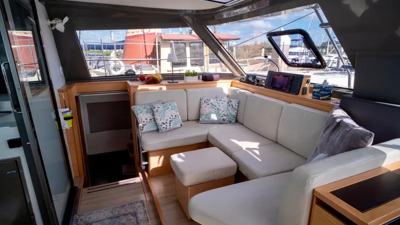 Slide: The Image of Interior of 2019 Nautitech 40 Open with cozy seating area. - 22