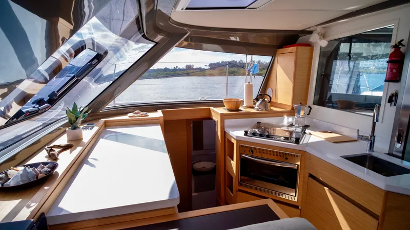 Slide: The Image of Interior of 2019 Nautitech 40 Open with modern kitchen. - 23