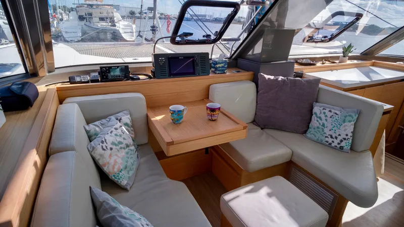 Slide: The Image of Interior of a 2019 Nautitech 40 Open yacht with cozy seating area. - 26