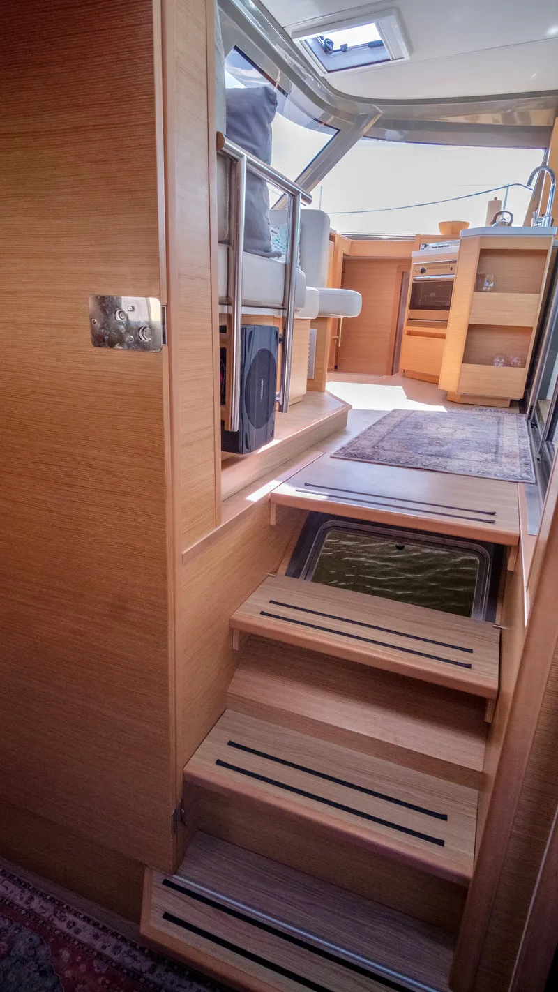 Slide: The Image of Interior of 2019 Nautitech 40 Open with wooden stairs. - 28