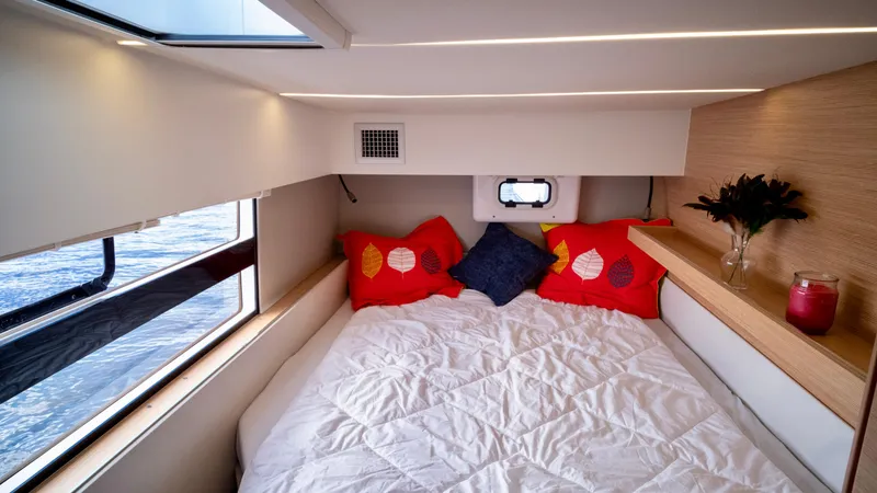 Slide: The Image of Interior of 2019 Nautitech 40 Open with cozy bed and windows. - 34