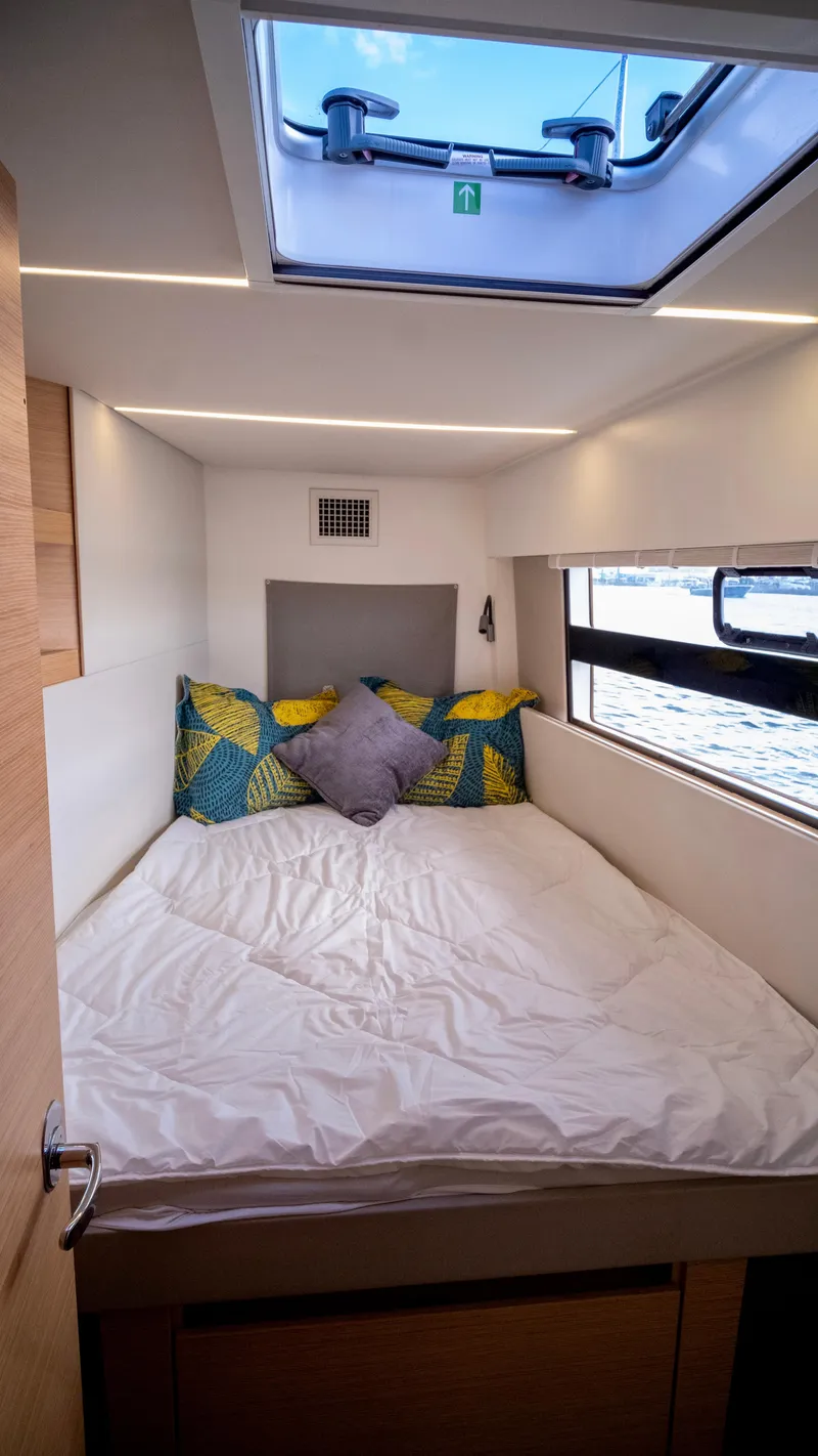 Slide: The Image of Interior of Nautitech 40 Open yacht, cozy bedroom with skylight. - 35