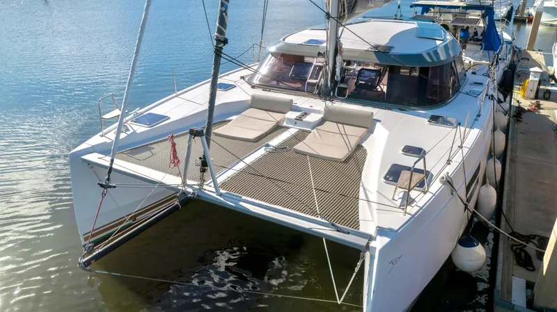 Slide: The Image of Nautitech 40 Open 2019 catamaran docked on a sunny day. - 4