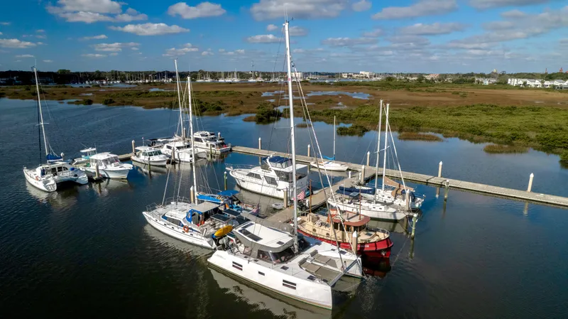 Slide: The Image of Nautitech 40 Open 2019 in a scenic harbor. - 5