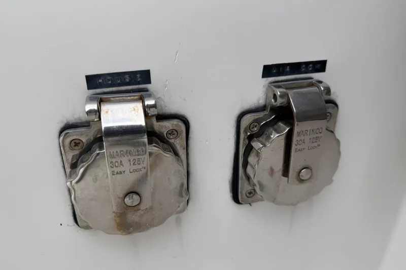 Slide: The Image of Nautitech 40 Open 2019 boat power outlets labeled "House" and "Air Con." - 57