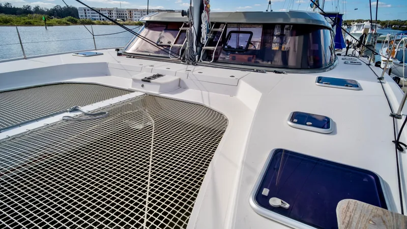 Slide: The Image of Nautitech 40 Open 2019 catamaran on calm waters. - 8