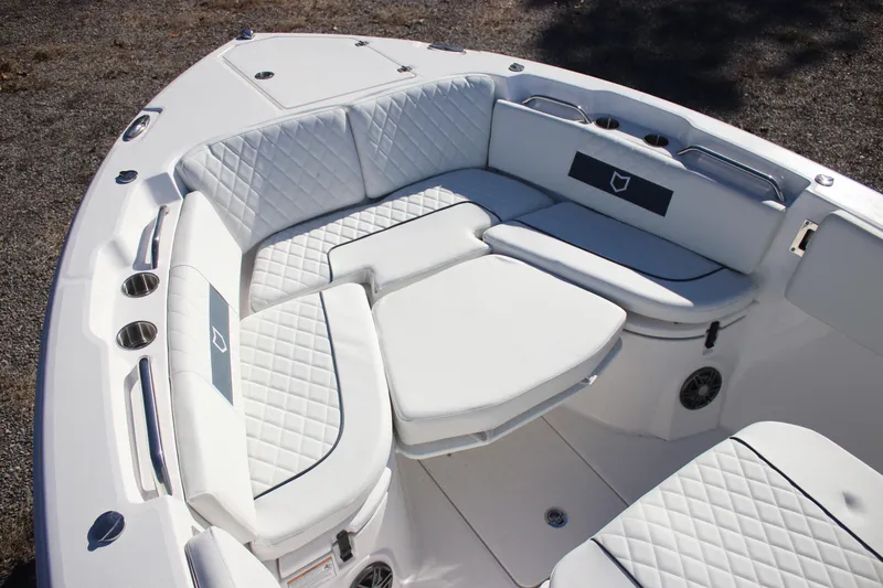 Slide: The Image of 2026 Sea Fox 268 Commander boat interior with white cushioned seating. - 22