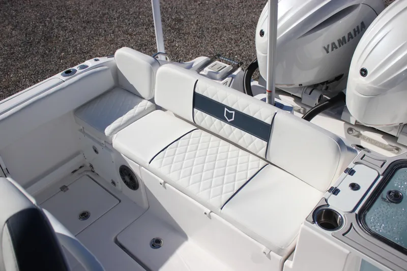 Slide: The Image of 2026 Sea Fox 268 Commander boat interior with Yamaha engines and cushioned seating. - 23