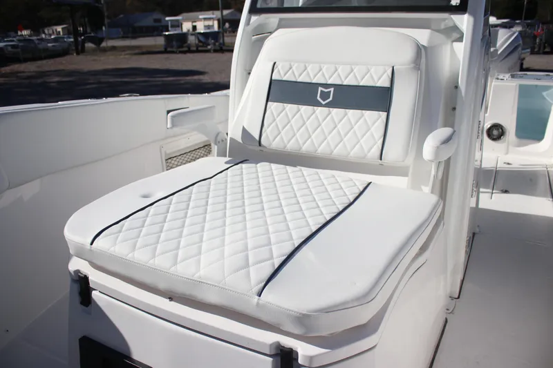 Slide: The Image of 2026 Sea Fox 268 Commander boat with luxurious white quilted seating. - 28