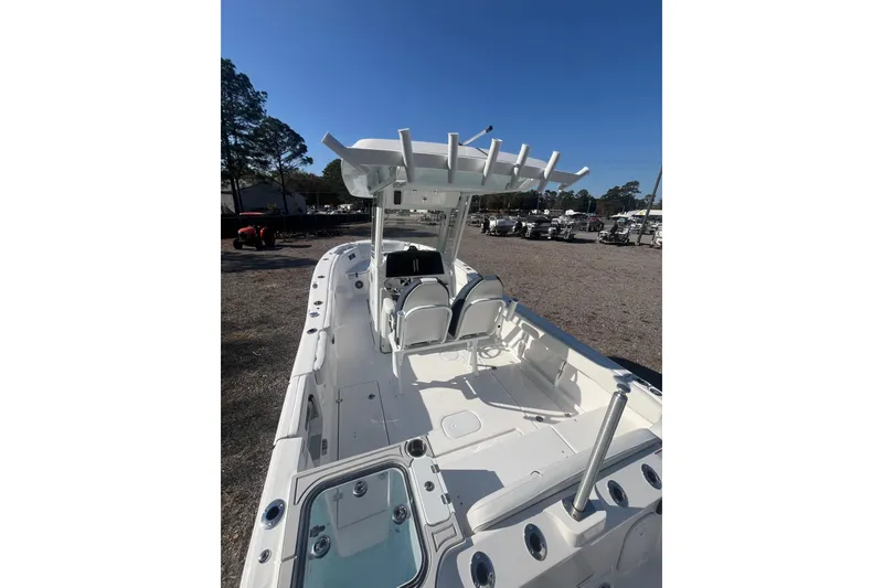 Slide: The Image of 2026 Sea Fox 268 Commander boat on trailer, parked outdoors. - 3