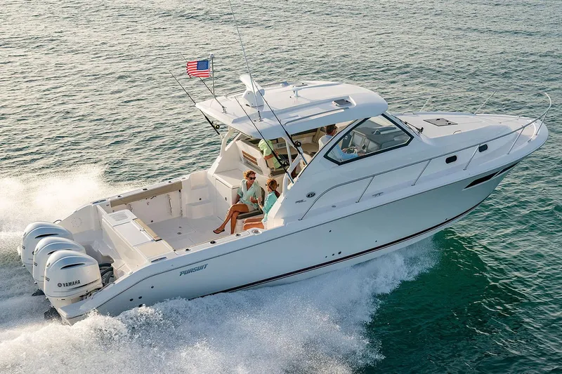 Slide: The Image of 2026 Pursuit OS 355 Offshore boat bathroom with compact toilet and modern design. - 30