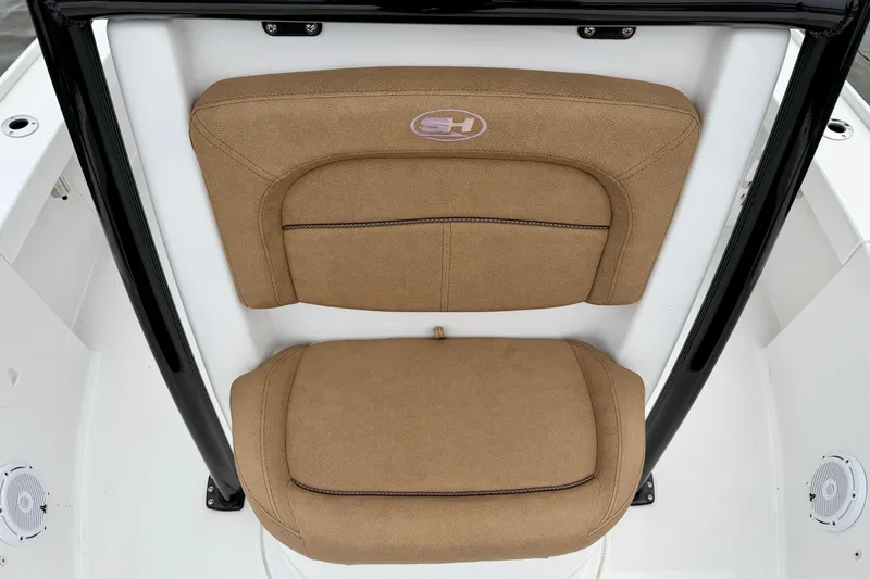 Slide: The Image of 2022 Sea Hunt BX 22 BR boat seat with tan upholstery and black frame. - 17