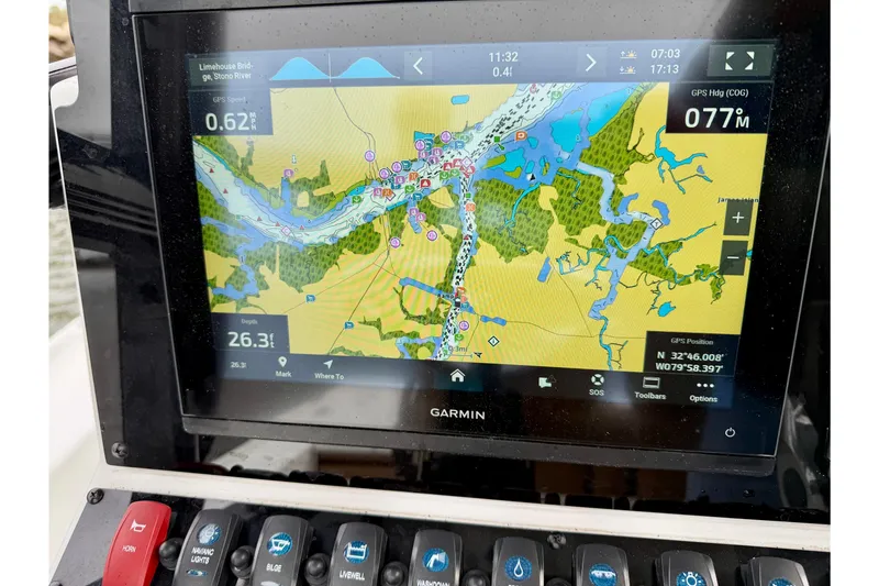 Slide: The Image of Garmin GPS display on 2022 Sea Hunt BX 22 BR boat, showing navigation map and controls. - 35