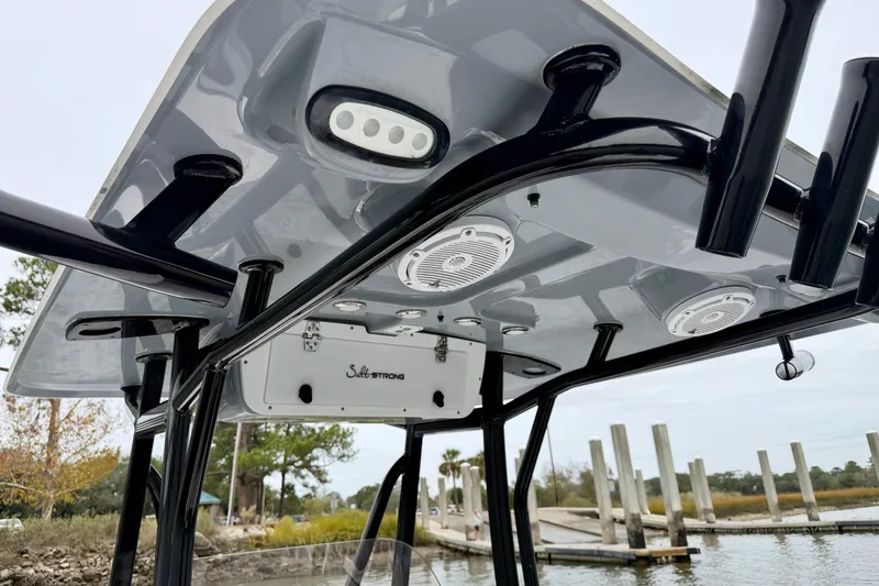 Slide: The Image of T-top of 2022 Sea Hunt BX 22 BR boat with speakers and rod holders. - 39