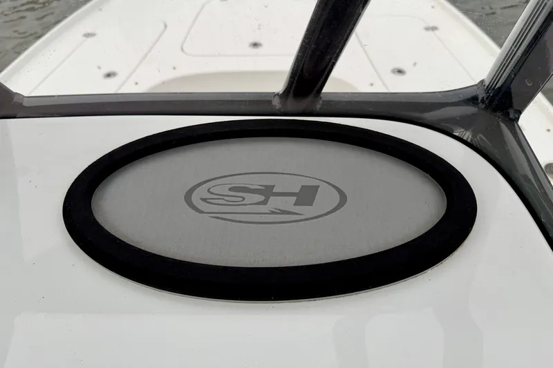 Slide: The Image of 2022 Sea Hunt BX 22 BR boat dashboard with logo, featuring sleek design elements. - 44