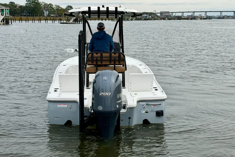 Slide: The Image of 2022 Sea Hunt BX 22 BR boat with Yamaha 200 engine on calm water. - 5