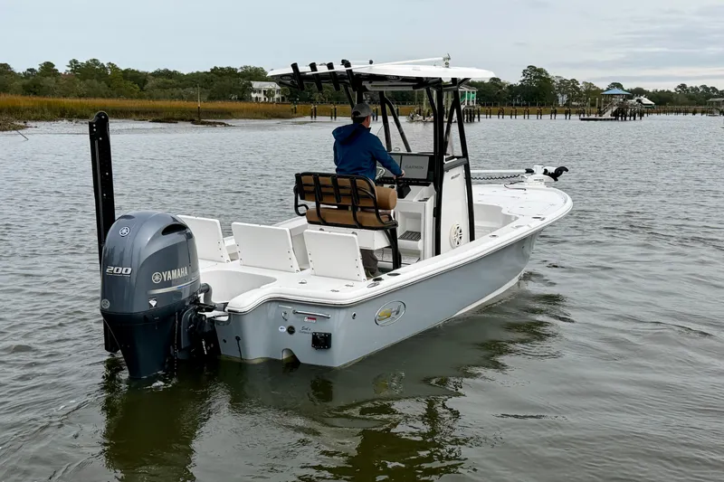 Slide: The Image of 2022 Sea Hunt BX 22 BR boat with Yamaha engine on calm water. - 6
