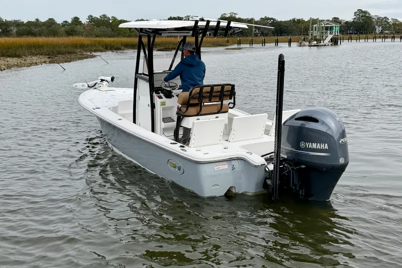 Slide: The Image of 2022 Sea Hunt BX 22 BR boat with Yamaha engine on calm water. - 7