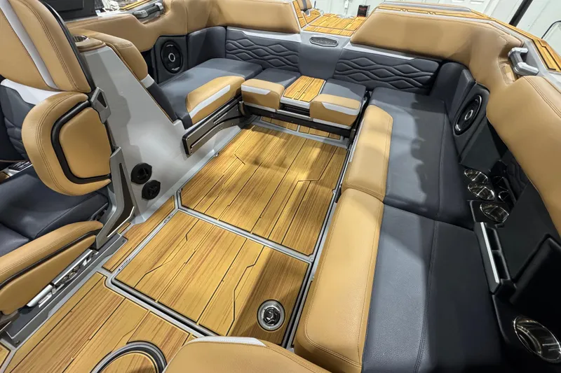 Slide: The Image of 2026 Supra SA interior with luxurious seating and wood-style flooring. - 14