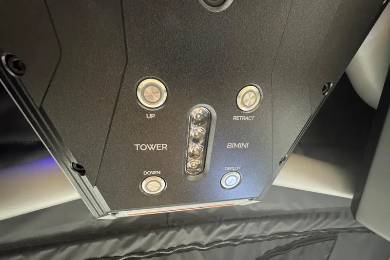 Slide: The Image of Control panel of 2026 Supra SA boat with tower and bimini buttons. - 26