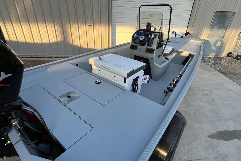 Slide: The Image of 2026 Tracker Bass Tracker Classic CC boat with modern console and seating. - 60