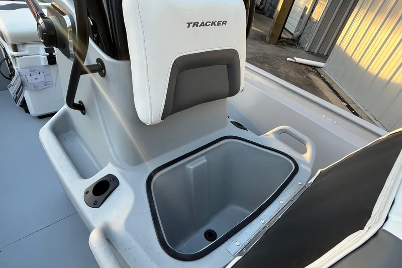 Slide: The Image of 2026 Tracker Bass Tracker Classic CC boat interior with storage compartment and seat. - 67