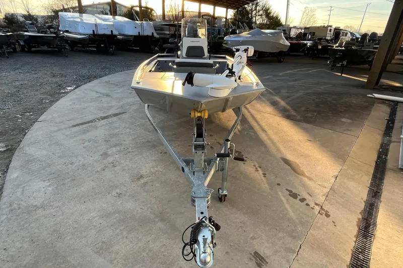 Slide: The Image of 2026 Tracker Bass Tracker Classic CC boat on trailer in outdoor showroom. - 76