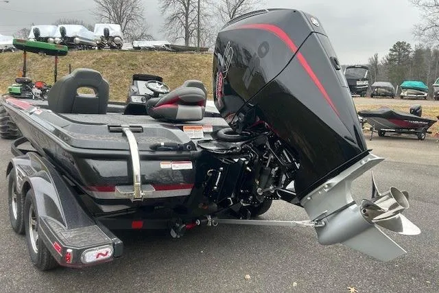 Slide: The Image of 2026 Nitro Z21 XL Pro boat with powerful outboard motor, parked on a trailer. - 109