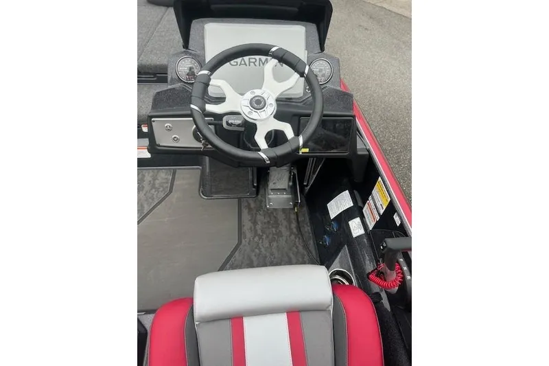Slide: The Image of 2026 Nitro Z21 XL Pro boat cockpit with Garmin display and steering wheel. - 111