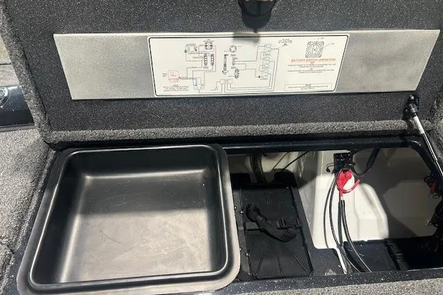 Slide: The Image of 2026 Nitro Z21 XL Pro boat storage compartment with battery and wiring diagram. - 115