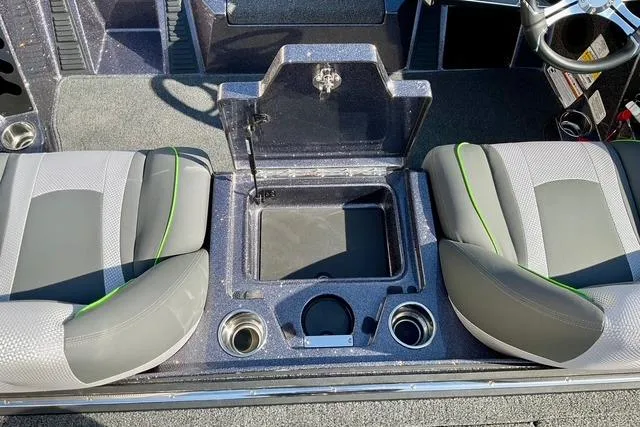 Slide: The Image of 2026 Ranger Z518 boat interior with storage compartment and seating. - 10