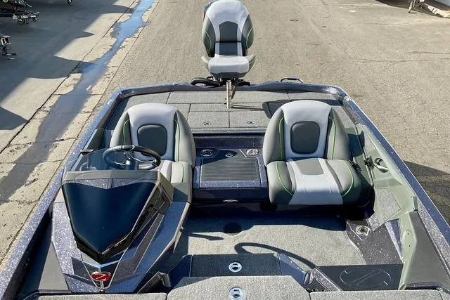 Slide: The Image of 2026 Ranger Z518 boat interior with dual seats and steering console. - 12