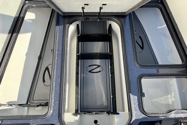 Slide: The Image of 2026 Ranger Z518 boat storage compartments with sleek design and organized layout. - 14