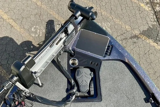 Slide: The Image of 2026 Ranger Z518 boat deck with trolling motor and control panel. - 17