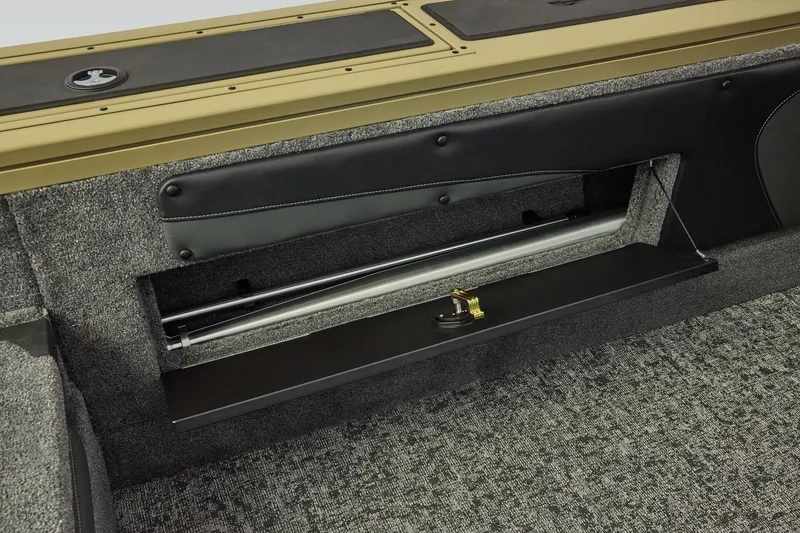 Slide: The Image of Interior of 2026 Tracker Targa V-19 Combo with storage compartment. - 35