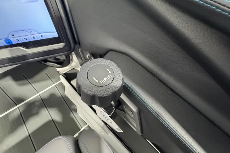 Slide: The Image of 2026 Supra SE interior with thrust control knob and touchscreen display. - 18