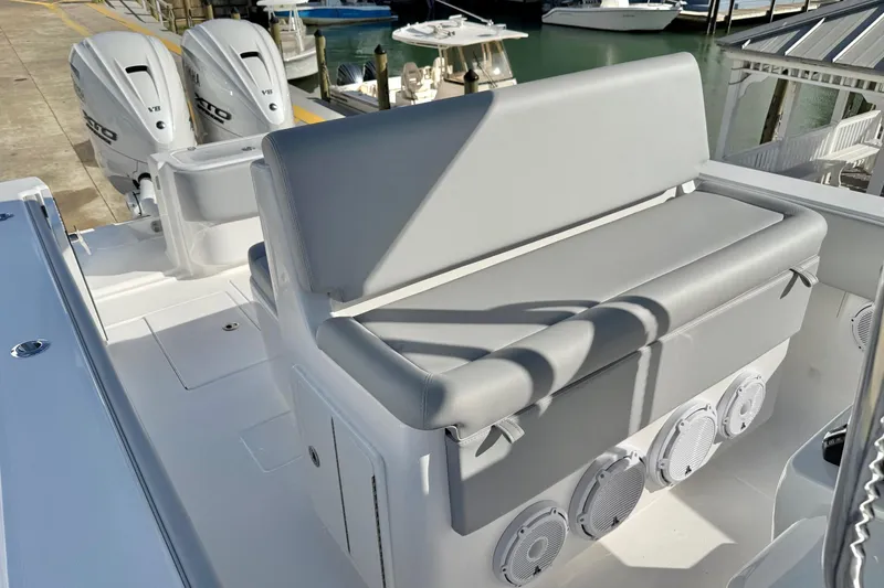 Slide: The Image of 2026 Contender 35 ST boat with dual engines and cushioned seating. - 17