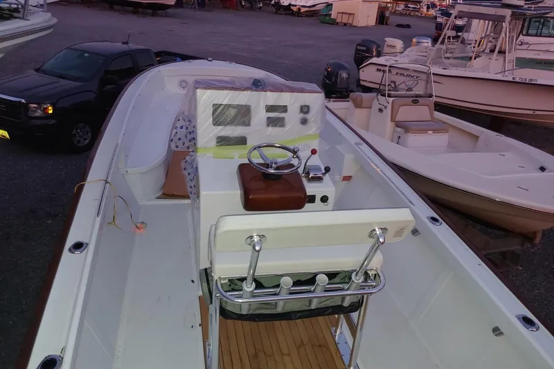 Slide: The Image of 1977 Wellcraft 270 Coastal O/B boat interior with steering console and seating. - 19