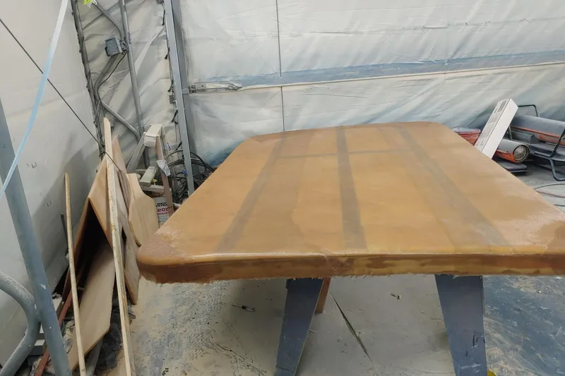 Slide: The Image of 1977 Wellcraft 270 Coastal O/B boat part under restoration in workshop. - 8