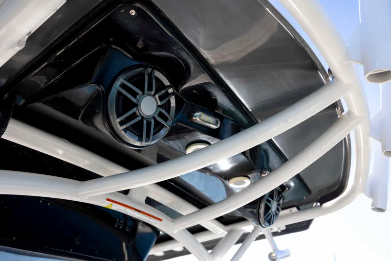 Slide: The Image of 2019 Wellcraft 222 Fisherman boat speakers and lighting detail. - 17